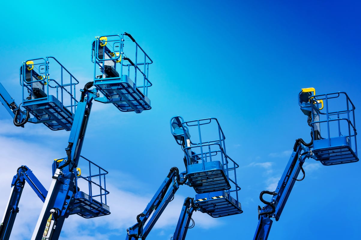 Articulated Boom Lift. Aerial Platform Lift. Telescopic Boom Lift against Blue Sky. Mobile Construction Crane for Rent and Sale. Maintenance and Repair Hydraulic Boom Lift Service. Crane Dealership.